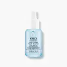O sticlă de 30 ml de Kiehl's Clearly Corrective Triple Acid Peel cu un lichid clar pe un fundal alb.