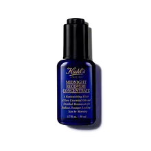 O sticlă de 30 ml de ulei facial Kiehl's Midnight Recovery Concentrate pe un fundal alb.