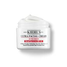 Un borcan de 125 ml de Kiehl's Ultra Facial Cream SPF 30 cu textură aerată pe un fundal alb.