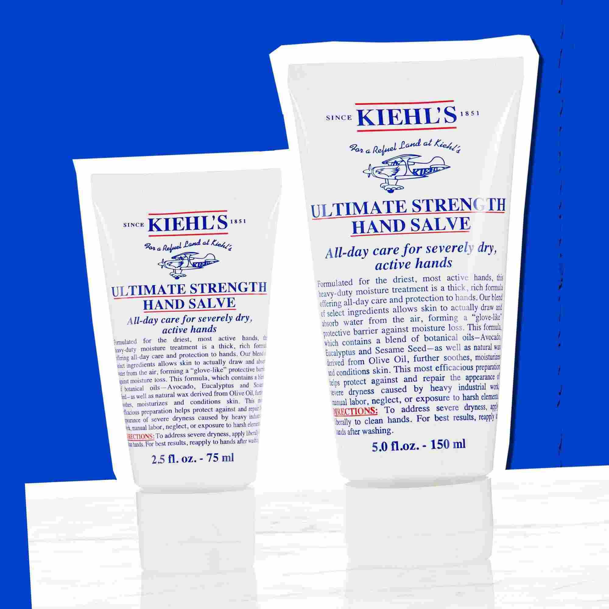 Două tuburi de Kiehl's Ultimate Strength Hand Salve care ilustrează dimensiunile disponibile