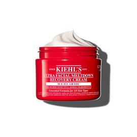Borcan roșu de Kiehl’s Ultra Facial Meltdown Recovery Cream Whip, cu o textură de cremă aerată.