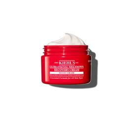 Borcan roșu de Kiehl’s Ultra Facial Meltdown Recovery Cream Whip, cu o textură de cremă aerată.