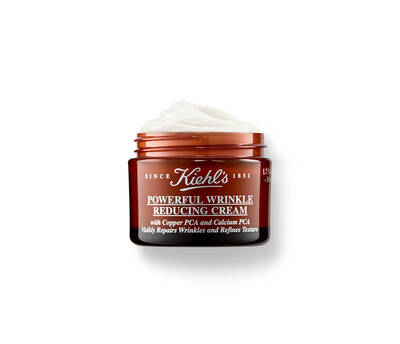 Crema hidratantă Kiehl's pentru reducerea ridurilor, cu PCA de cupru și calcium, intr-un recipient elegant.