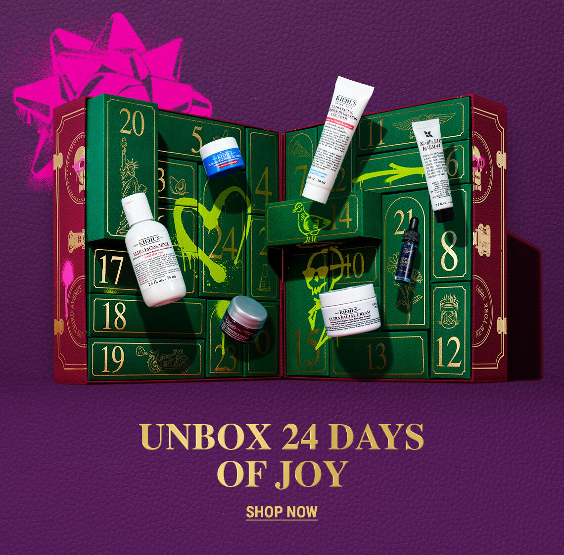 he left side features an open green Kiehl’s Advent Calendar with visible numbered compartments. Several Kiehl's skincare products are shown, some appearing to be removed from the calendar, including white tubes, dark jars, and a blue jar. Bright green graphic accents are seen on the calendar itself. The right side of the graphic is a solid purple background with white text that reads "HOLIDAY DROP: KIEHL'S ADVENT CALENDAR" and a smaller "SHOP NOW" below it.