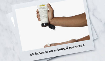 A hand pouring a non-greasy hair product into the palm, with text below that reads "Condition and smooth with a non-greasy formula."
